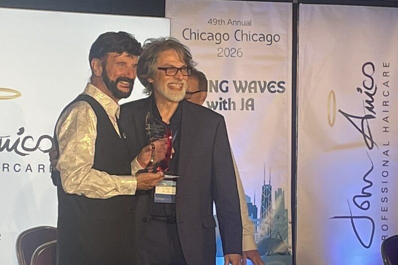 John Amico receiving the Enduring Legacy Award on stage at the 49th Annual Chicago Chicago 2026 event
